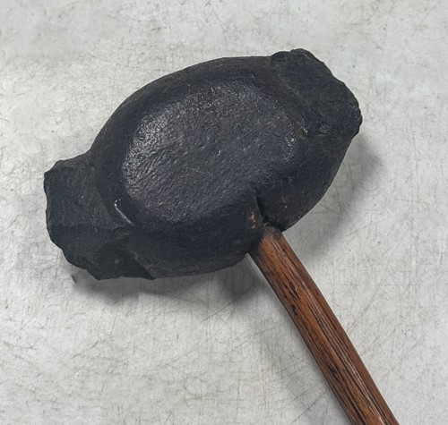 Lot 673 - A primitive stone axe head, likely of American origin