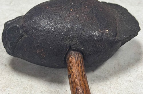 Lot 673 - A primitive stone axe head, likely of American origin