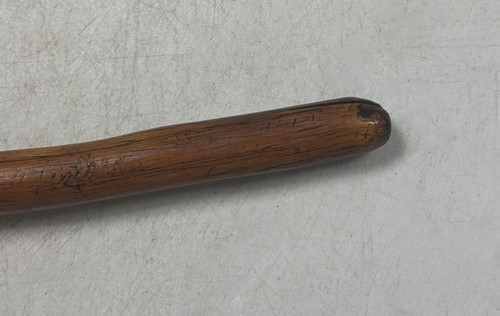 Lot 673 - A primitive stone axe head, likely of American origin