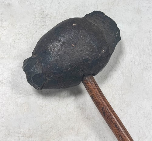 Lot 673 - A primitive stone axe head, likely of American origin