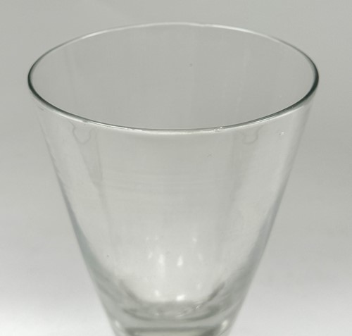 Lot 372 - A heavy baluster wine glass, early 18th century