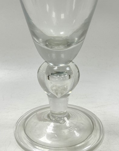 Lot 372 - A heavy baluster wine glass, early 18th century