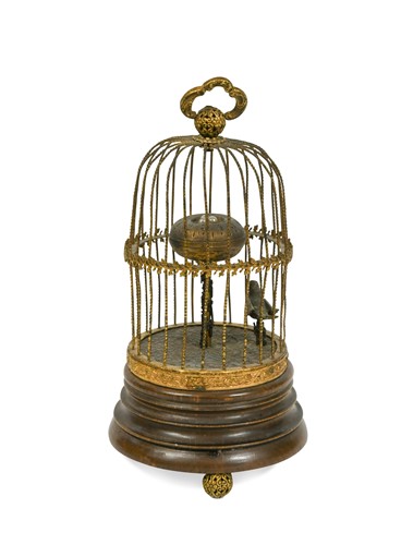 Lot 243 - A gilt metal and walnut novelty bird-cage automaton table timepiece