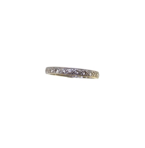 Lot 58 - A diamond set full eternity ring