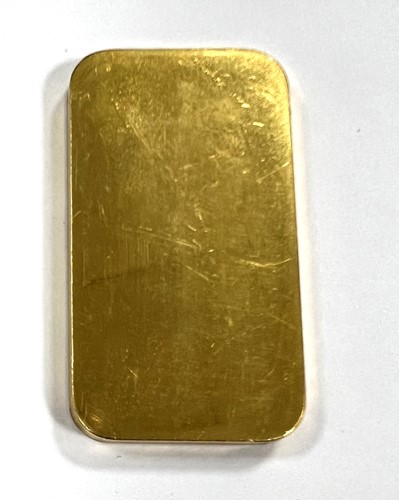 Lot 319 - Johnson Matthey for Credit Suisse - A 'four nines' gold bullion bar paperweight