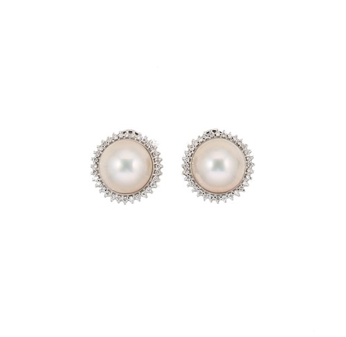 Lot 128 - A pair of mabé pearl and diamond ear clips