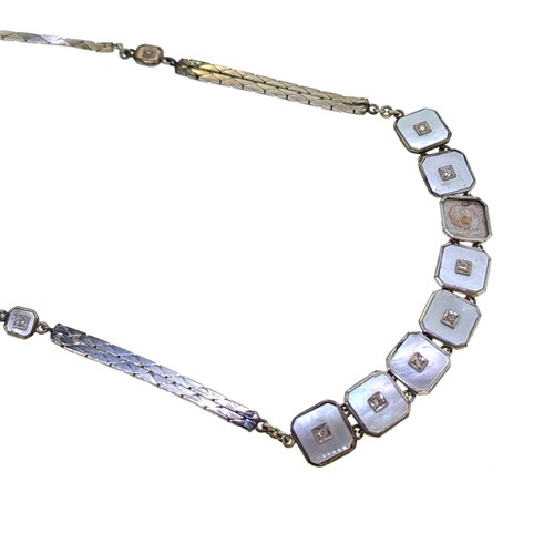 Lot 118 - A mother of pearl and diamond necklace