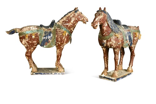 Lot 208 - A pair of Tang style carved and gessoed horses