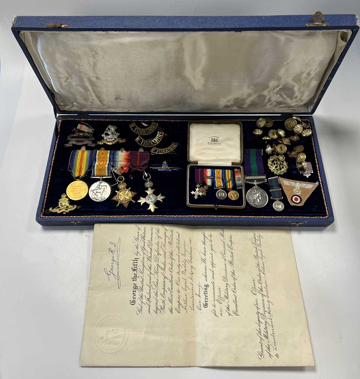 Lot 70 - A WW1 group of 3 medals and OBE (1914 Star...