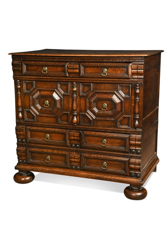 Lot 123 - A William and Mary oak geometric two-part chest, late 17th century