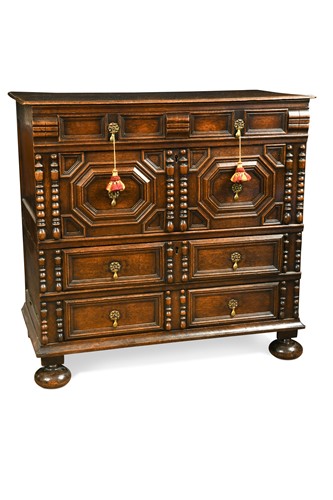 Lot 120 - A William and Mary oak geometric two-part chest, late 17th century