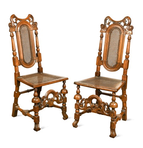 Lot 27 - A pair of walnut high-back chairs, 17th century