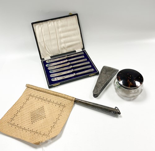 Lot 197 - A silver scissors holder together with a...