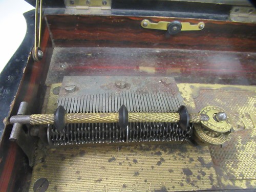 Lot 101 - A Polyphon disc musical box, serpentine shaped...