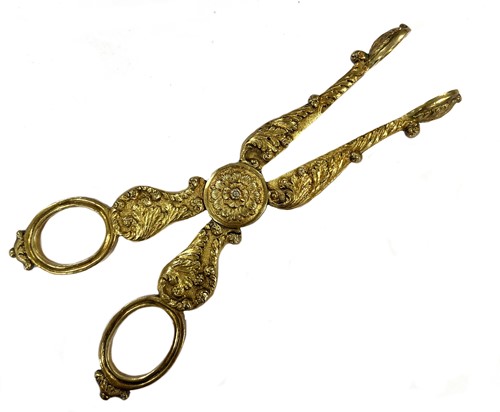 Lot 308 - A pair of George III cast silver gilt tea tongs