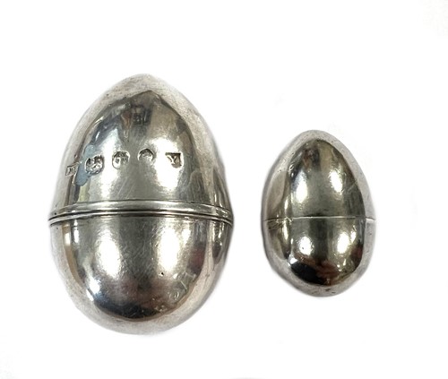 Lot 290 - An 18th century silver nutmeg grater, together with another