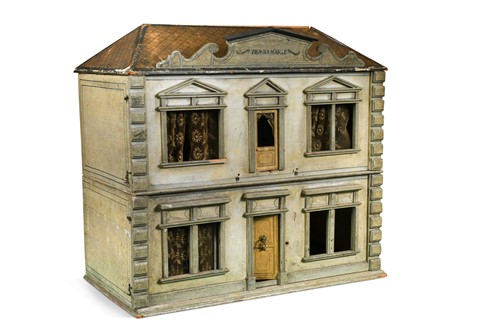 Lot 187 - A grey-painted and rusticated dolls' house, circa 1890, probably Continental