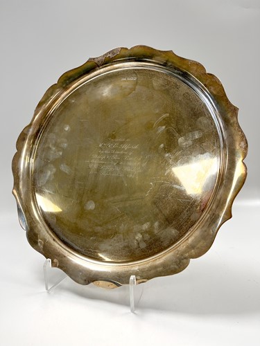 Lot 189 - A silver tray with presentation inscription,...