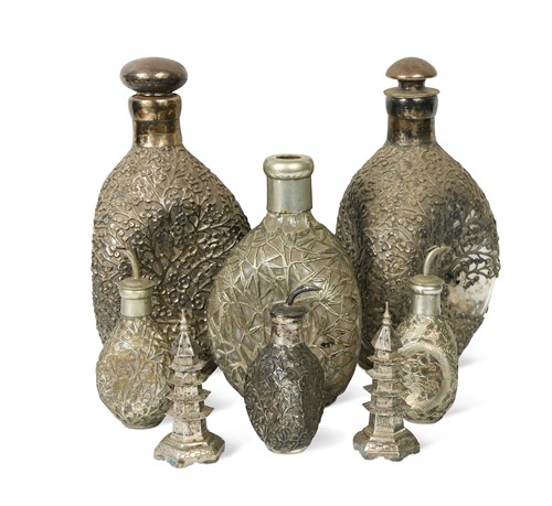 Lot 51 - A pair of Chinese silver overlaid dimple decanters, Yeohing, Tientsin, circa 1900