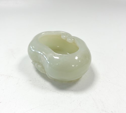 Lot 28 - A Chinese mutton fat jade lingzhi brush washer, Qing Dynasty, 18th/19th century