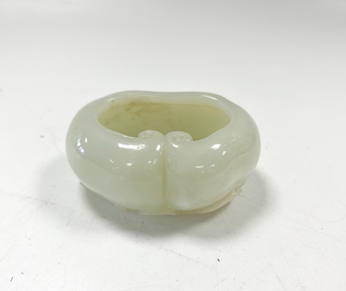 Lot 28 - A Chinese mutton fat jade lingzhi brush washer, Qing Dynasty, 18th/19th century