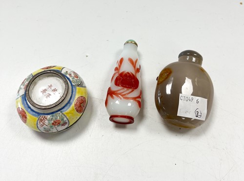 Lot 30 - A Chinese Canton enamel small boy and dog box and cover, Qing Dynasty 18/19th century