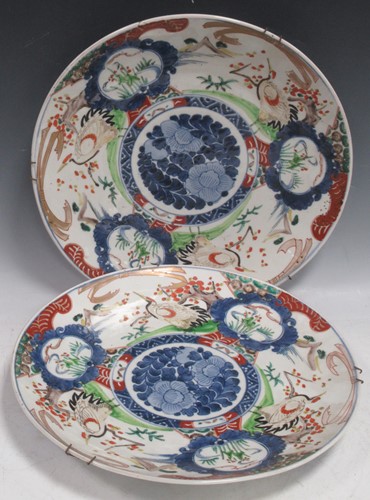 Lot 30 - A pair of Chinese Imari chargers, the centres...