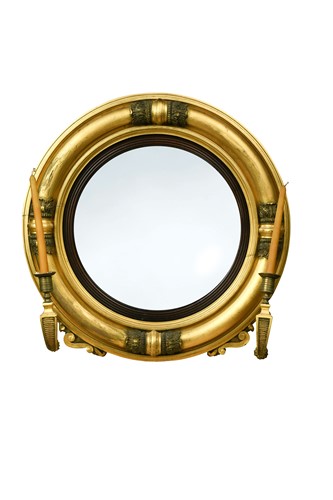 Lot 585 - A Regency circular gilt frame convex mirror