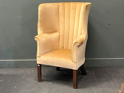 Lot 365 - A 19th century barrel back wing armchair
