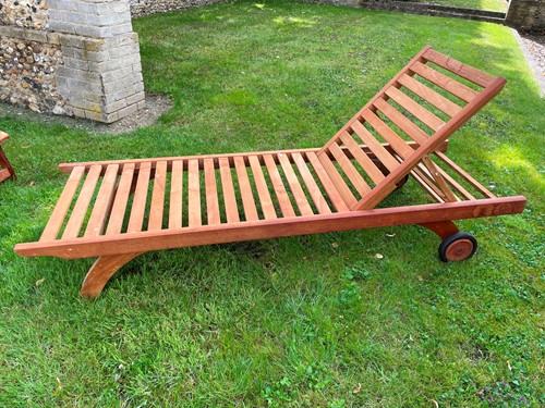 Lot 444 - Barlow Tyrie teak reclining patio chair on...