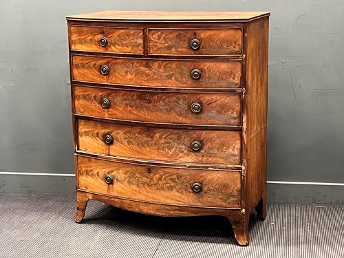Lot 373 - A 19th century mahogany bow front chest of...