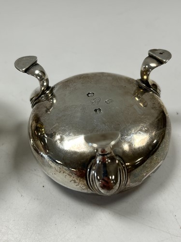 Lot 191 - A mid 18th century silver cauldron salt, mark...
