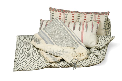 Lot 548 - A matched pair of Anatolian embroidered pillows, mid 20th century