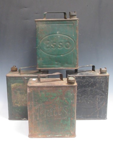 Lot 105 - Four 20th century metal petrol cans, two Esso,...