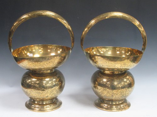 Lot 102 - Pair Indian brass watercarriers, with floral...
