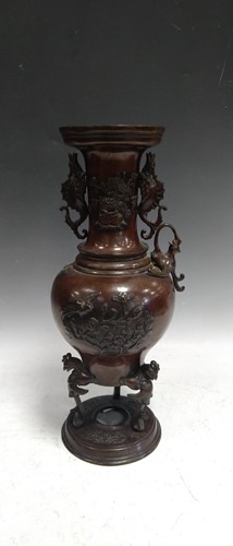 Lot 82 - A bronze Japanese two handled vase, Meiji...