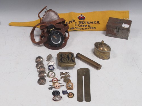 Lot 124 - A collection Militaria, to inlcude a field...