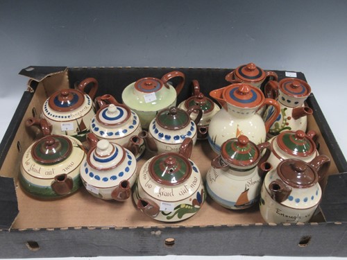 Lot 51 - An assortment of Torquay ware tea and coffee...