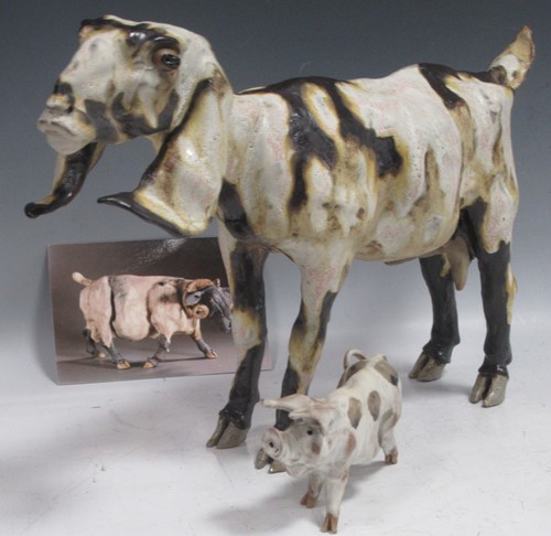 Lot 46 - Elaine Peto - ceramic goat 42cm wide, and...