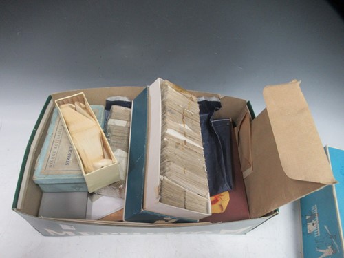 Lot 130 - A collection of postage stamps and cigarette...