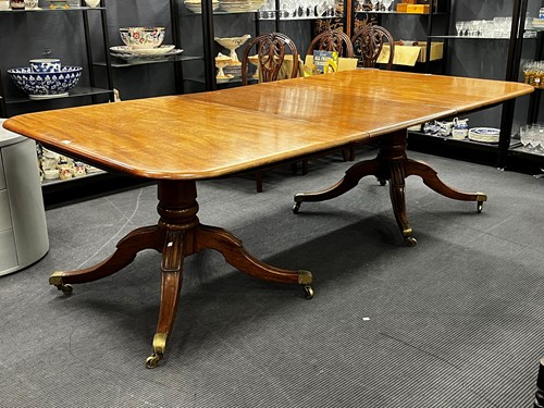 Lot 417 - A mahogany twin pedestal dining table, early 19th century.