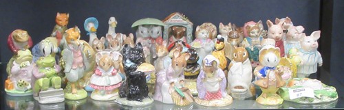 Lot 87 - Beswick Pottery - Peter Rabbit figures to...