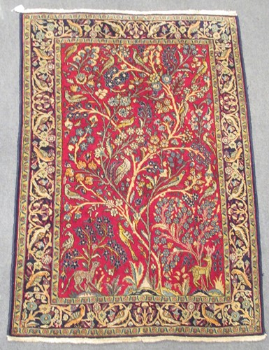 Lot 454 - A Tabriz tree of life rug birds and animals on...