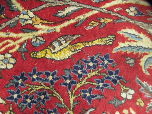 Lot 454 - A Tabriz tree of life rug birds and animals on...