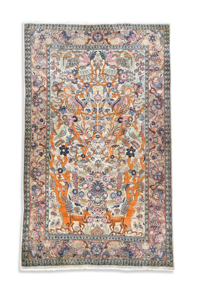 Lot 554 - A Persian hunting design Qum rug