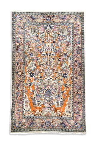 Lot 554 - A Persian hunting design Qum rug