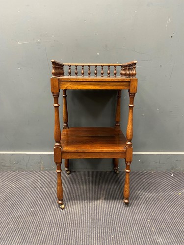 Lot 640 - A Victorian rosewood two tier whatnot table or...