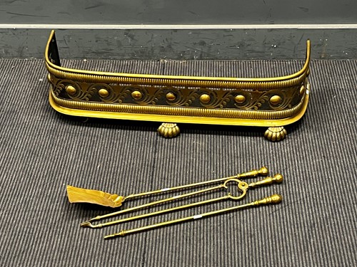 Lot 433 - A Victorian brass fender 90cm W, with a set of...
