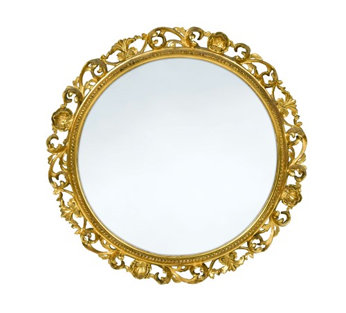 Lot 589 - A Florentine style circular carved giltwood mirror, 19th/ 20th century