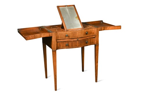 Lot 504 - A mahogany serpentine fronted dressing table, 19th century